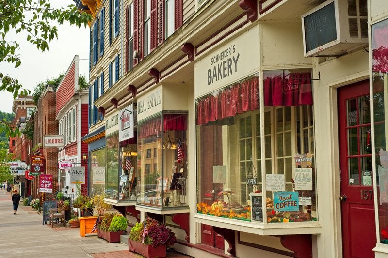 a store front with signs