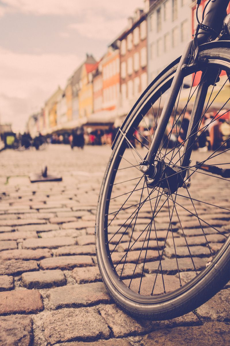 Bicycle wheel on Nyhavn Street in Copenhagen