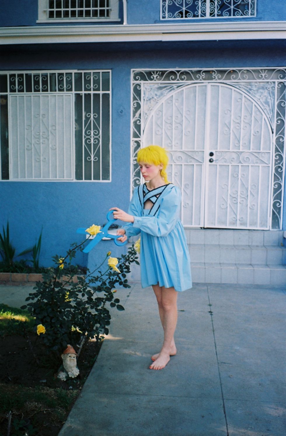 Blue, Yellow, Leg, Dress, Textile, Architecture, Electric blue, Plant, Door, House, 