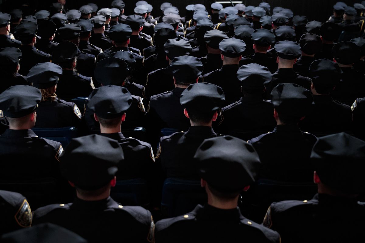 new york, ny   march 30 the newest members  of the new york city police department nypd attend their police academy graduation ceremony at the theater at madison square garden, march 30, 2017 in new york city over 600 new officers were sworn in during the ceremony photo by drew angerergetty images