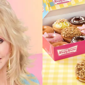 a woman smiling next to a box of donuts