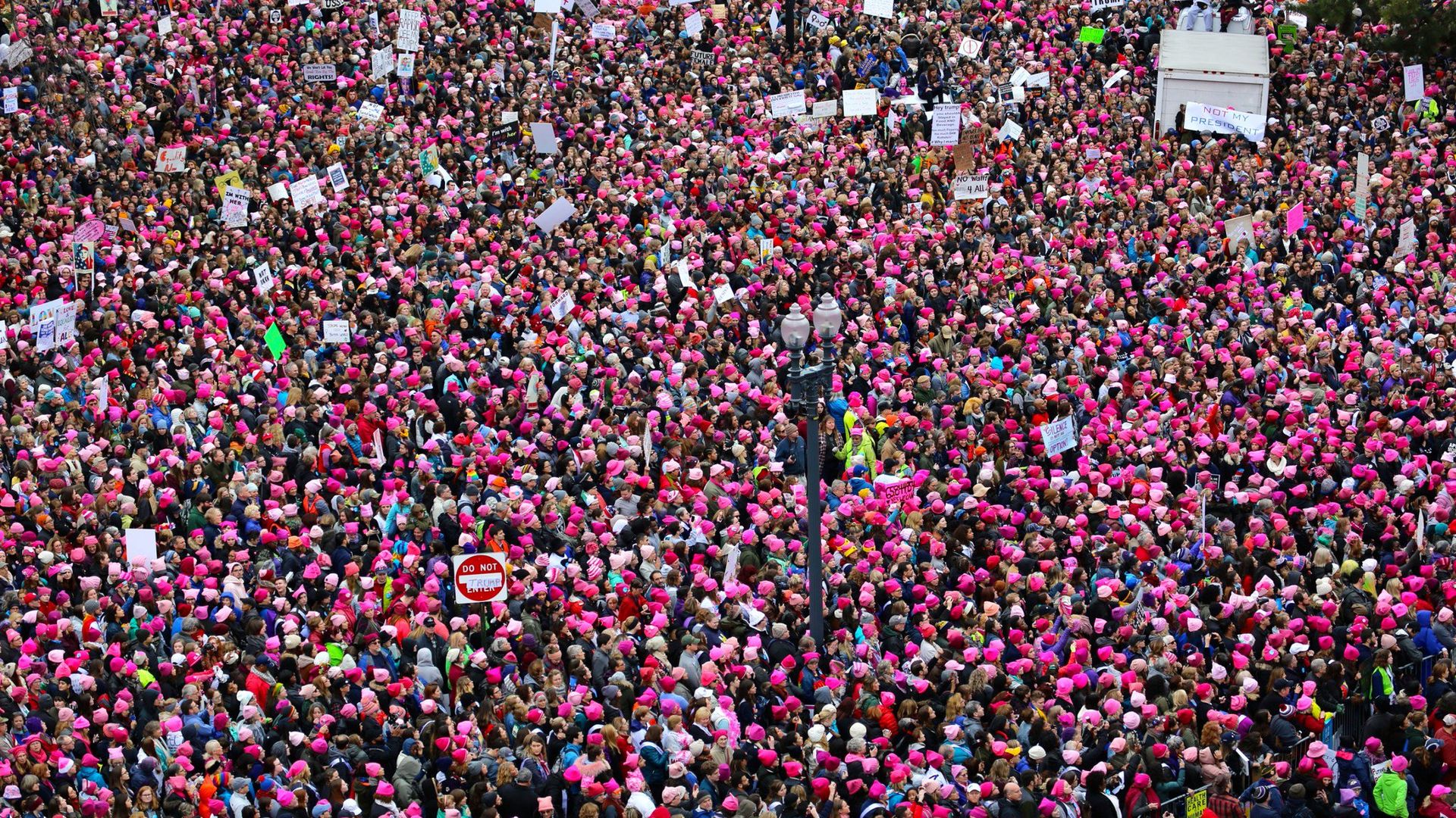 attendants of the historic 2017 women’s march create a sea of pink hats  in washington, dc