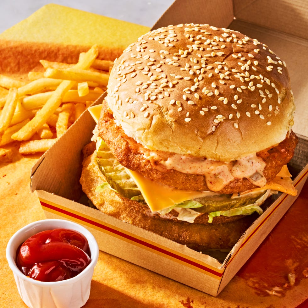 chicken big mac with pickles, lettuce, and special sauce between buns