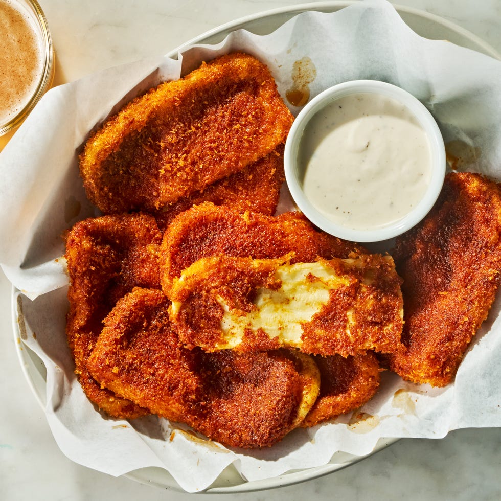 mozzarella sticks covered in hot sauce