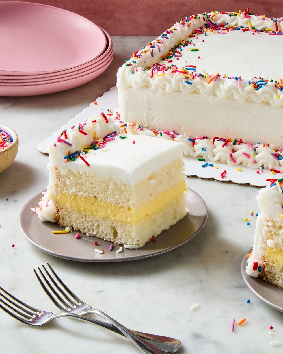 copycat costco sheet cake filled with vanilla cheesecake mousse and decorated with sprinkles