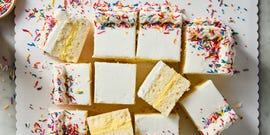 copycat costco sheet cake filled with vanilla cheesecake mousse and decorated with sprinkles