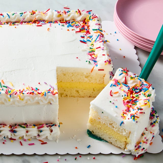 copycat costco sheet cake filled with vanilla cheesecake mousse and decorated with sprinkles