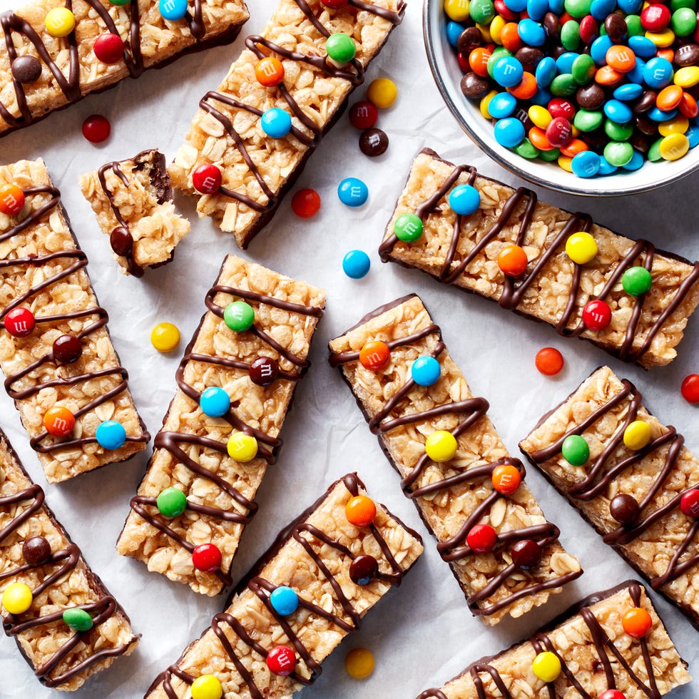 copycat kudos bars topped with chocolate and candy
