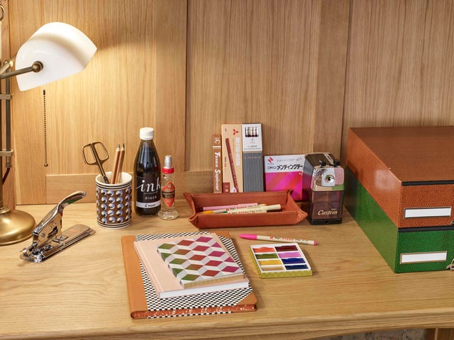 stationary on a wooden desk