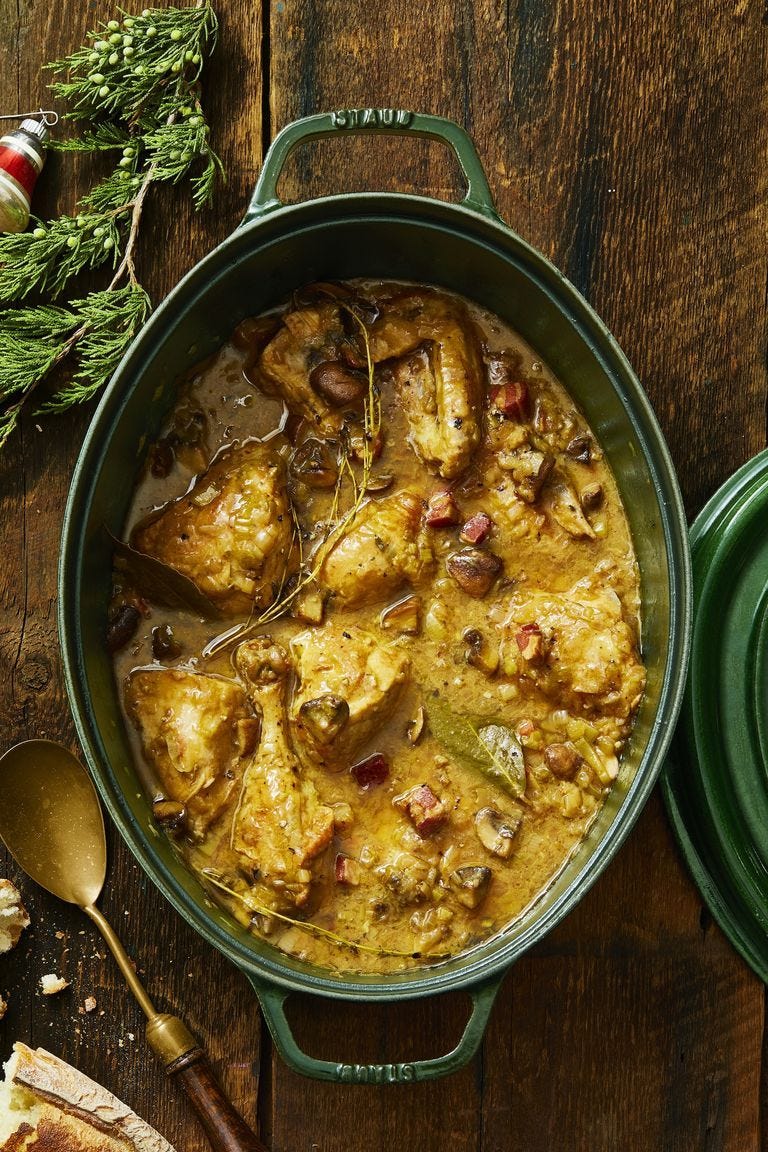 coq au vin rosé in a green dutch oven pot