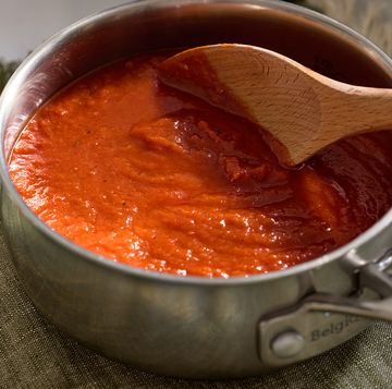 a pot with marinara sauce