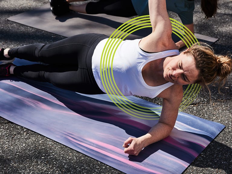 core exercises for runner two women doing a side plank on yoga mats