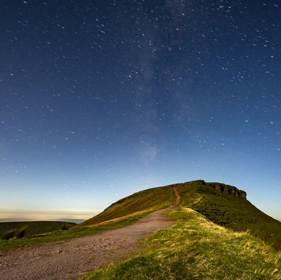 corn du from pen y fan with stars at night in the brecon beacons, wales