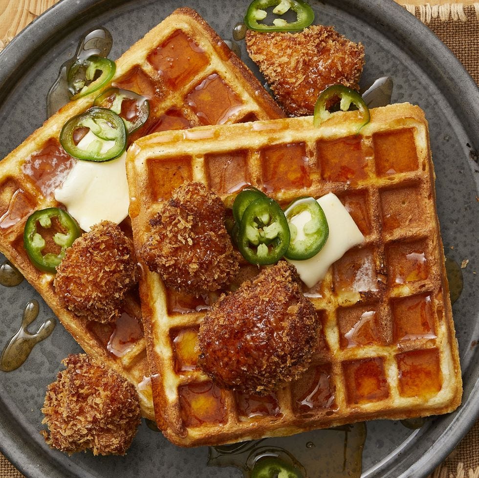 https://hips.hearstapps.com/hmg-prod/images/cornbread-waffles-with-spicy-chicken-recipe-1616615180.jpg?crop=0.9979591836734694xw:1xh;center,top&resize=980:*