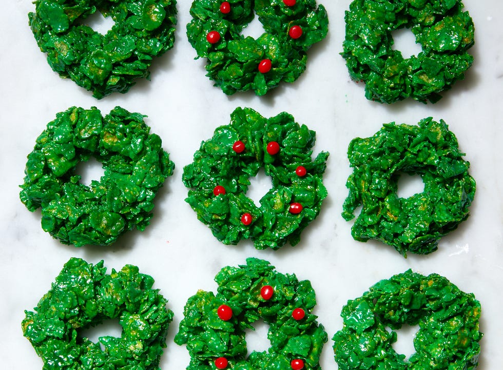 green cornflake marshmallow treat wreaths with red candy holly berries