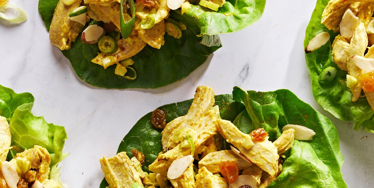 coronation chicken salad in lettuce cups with golden raisins and scallions