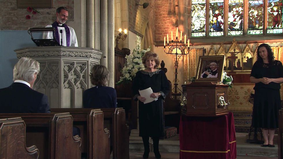 rita tanner addresses the mourners at norris cole's funeral in coronation street