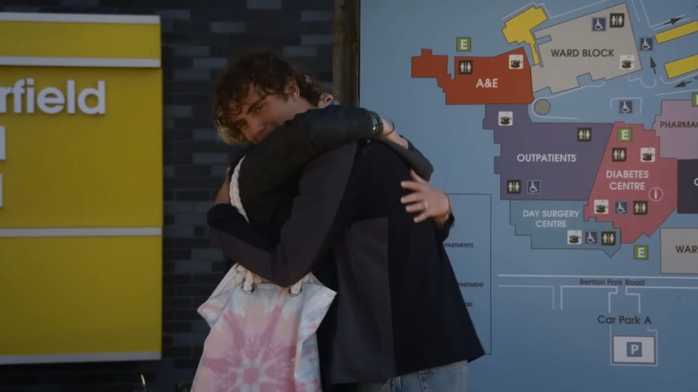 coronation street, brody and bernie hug outside a hospital