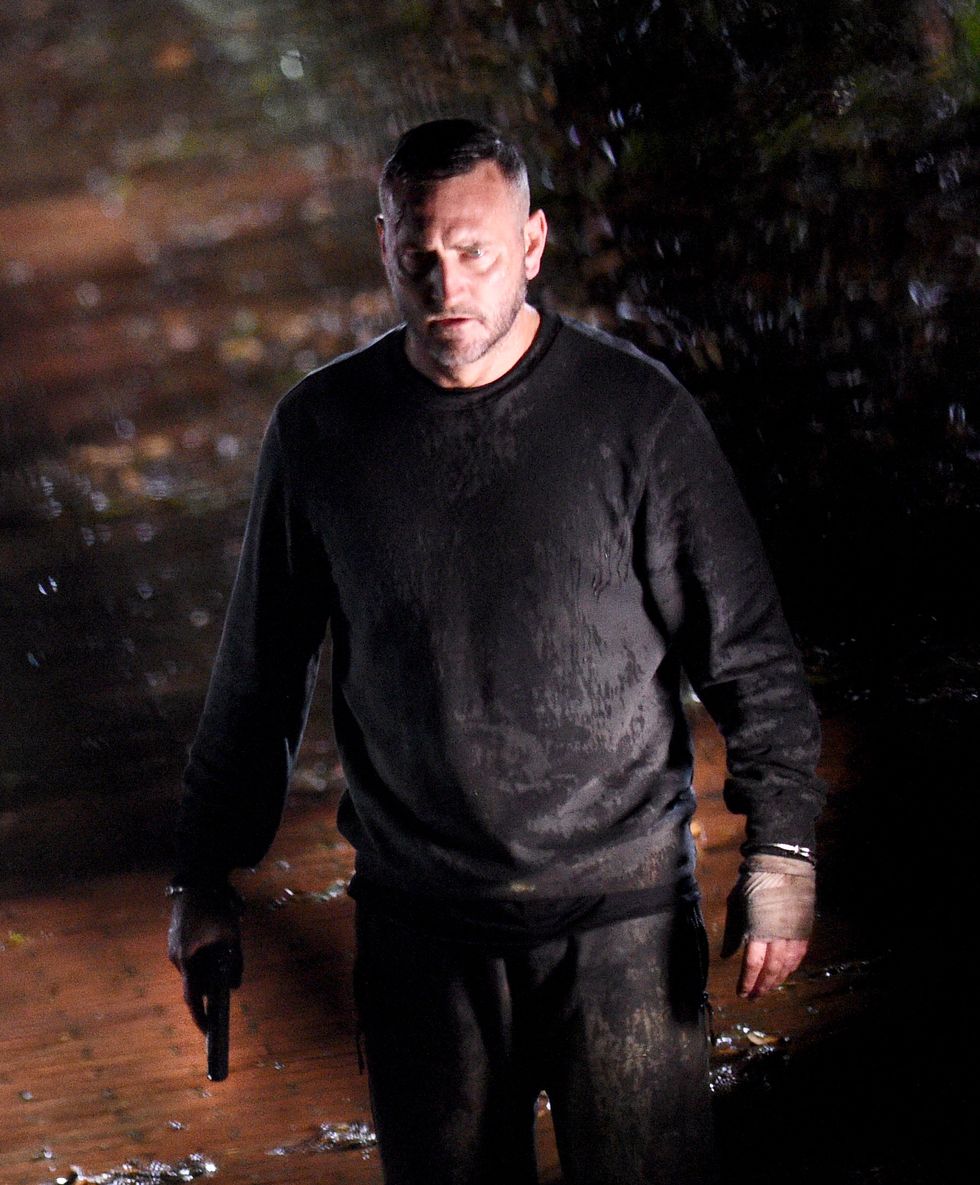 will mellor filming harvey gaskell holding a gun while escaping, coronation street