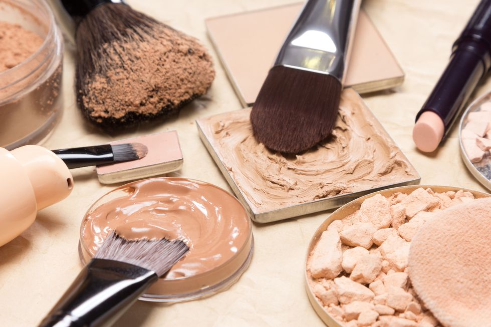 corrective makeup products and accessories close up