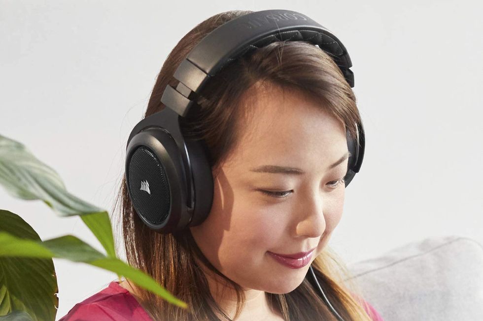 woman wearing corsair hs50 pro gaming headset