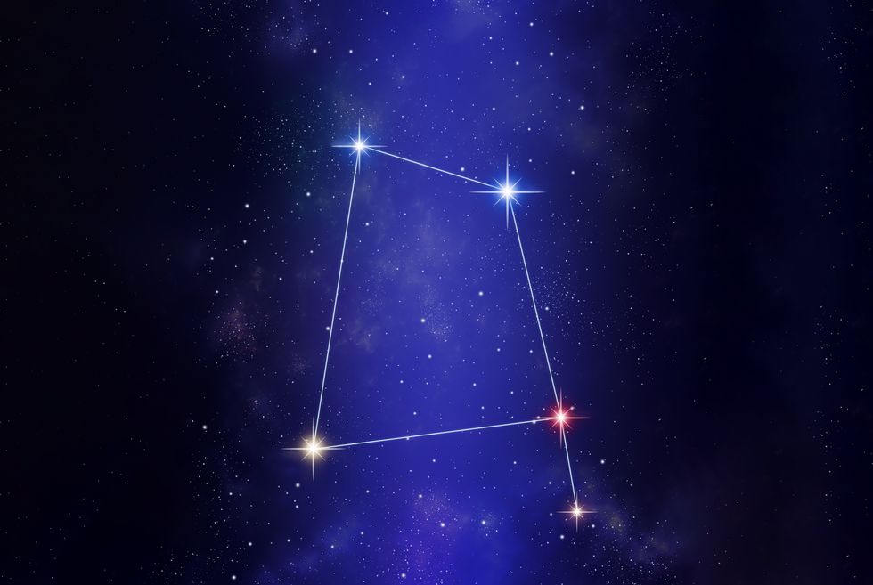 corvus the crow constellation on a starry space background