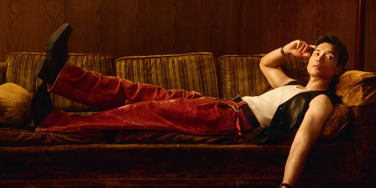 manny jacinto laying on a couch manny jacinto laying on a couch