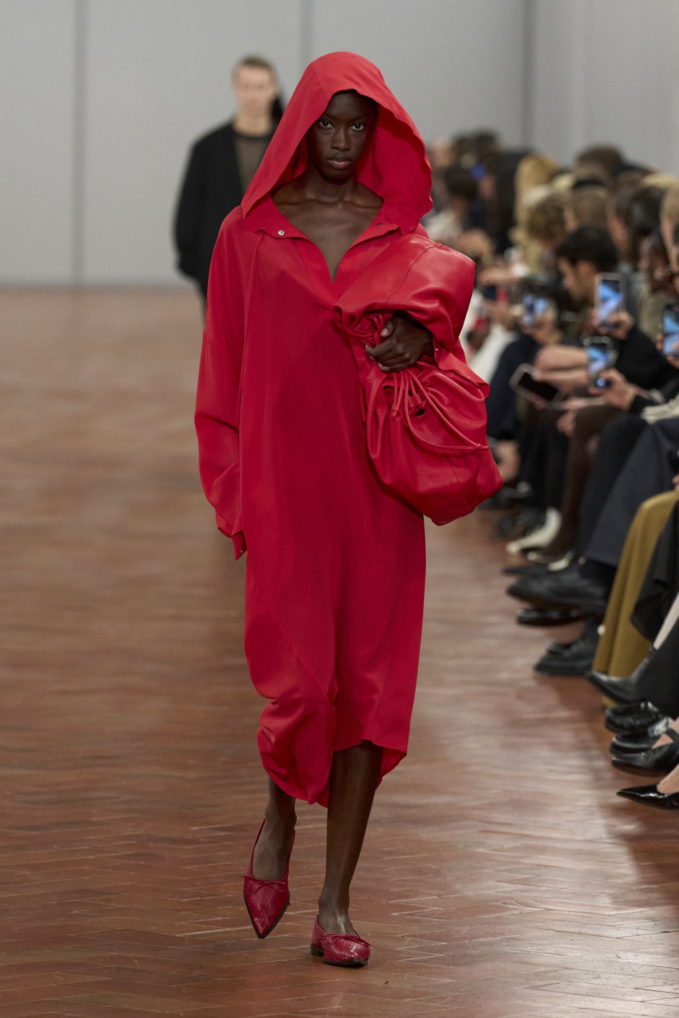a person wearing a red robe