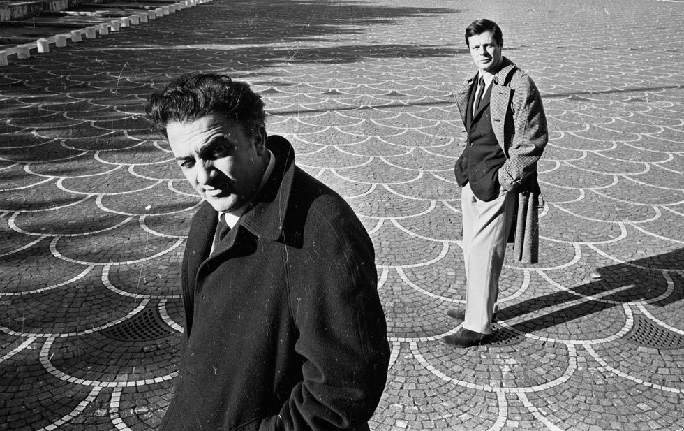 Film director Federico Fellini with actor Marcello Mastroianni in EUR Rome, 1962