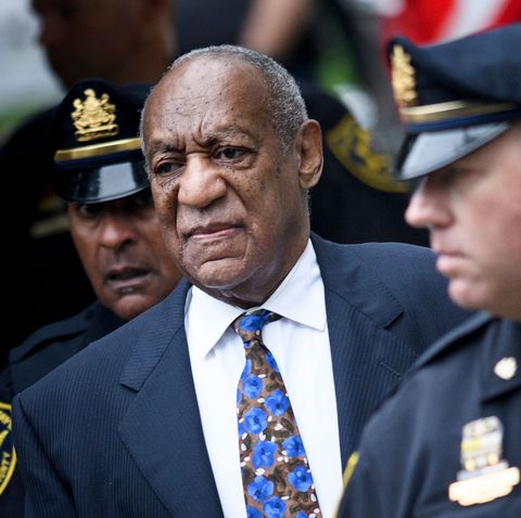 cosby in a suit on the way to court