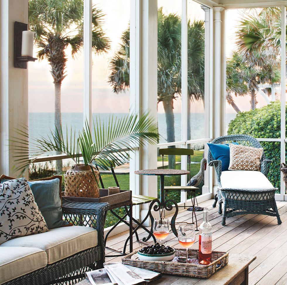 screened in porch with ocean view