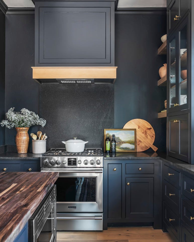 oklahoma designer kelsey leigh mcgregor used charcoal gray negresco granite on the backsplash and countertops of this kitchen so they would nearly disappear against the dark paint paint after midnight, kelly moore paints range frigidaire professional art vintage