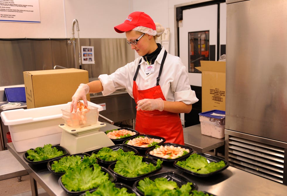 costco employee aliaksandra lobkis weighed shrimp for shrimp cocktails she was putting together at the store at 4000 river point parkway in sheridan friday afternoon, october 28, 2011 karl gehringthe denver post