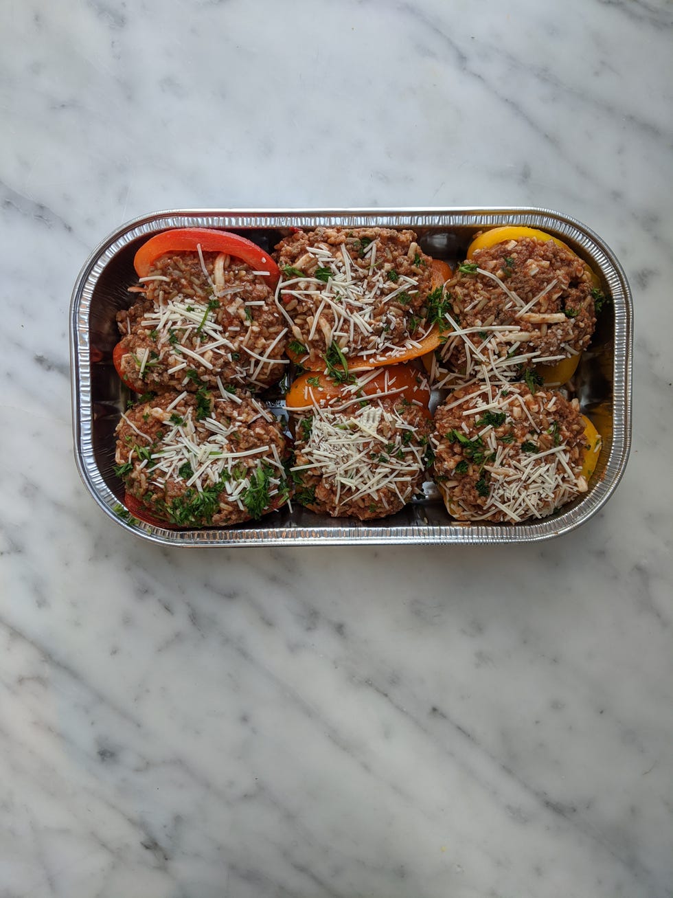 costco stuffed bell peppers with ground beef and rice in aluminum tray