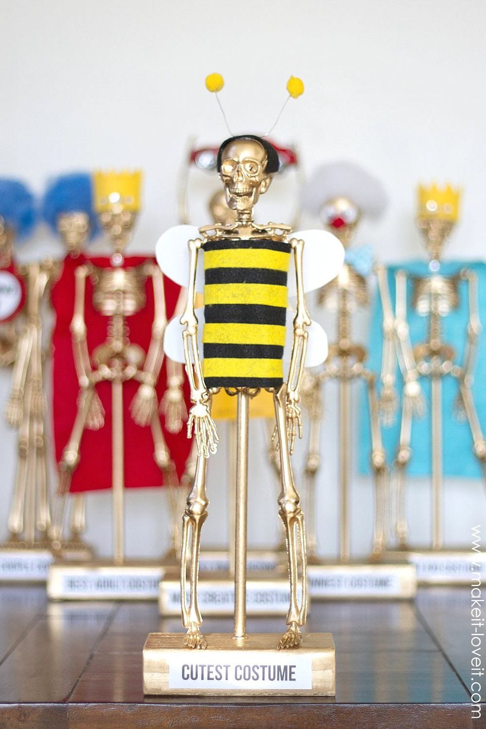halloween party ideas, skeleton costume trophies