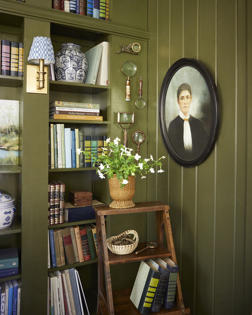 bambi costanzo 1920s bungalow green den with book shelves and library ladder