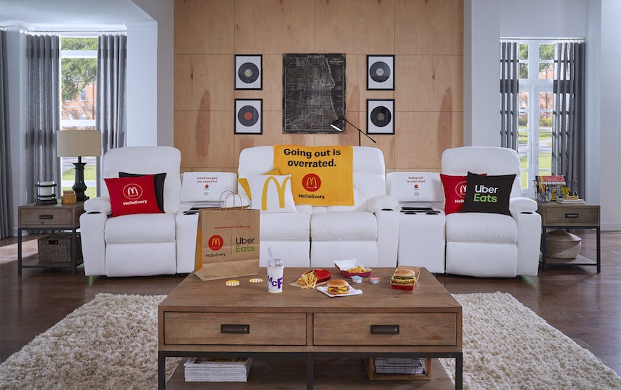 Living room, Furniture, Room, Couch, Interior design, Coffee table, Property, Table, Orange, Wall, 