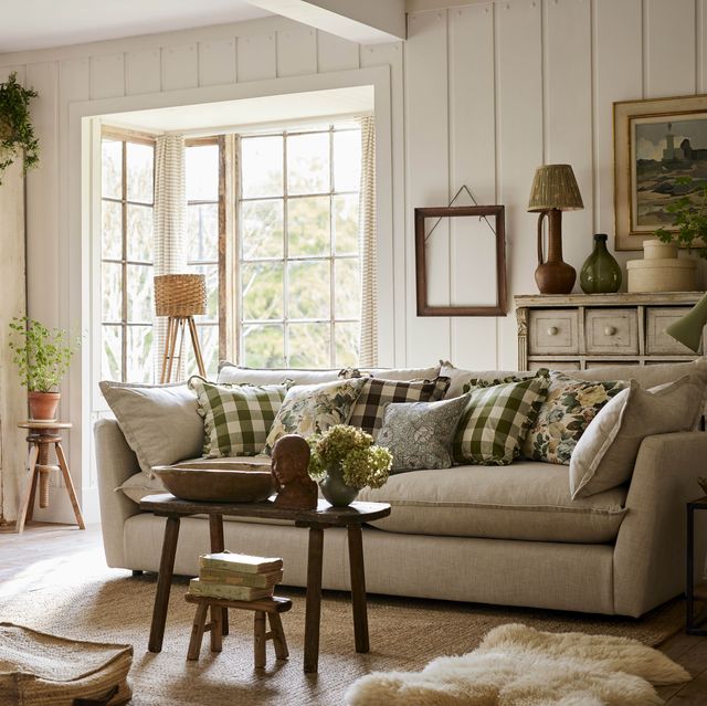 a country style living room with a couch and a table