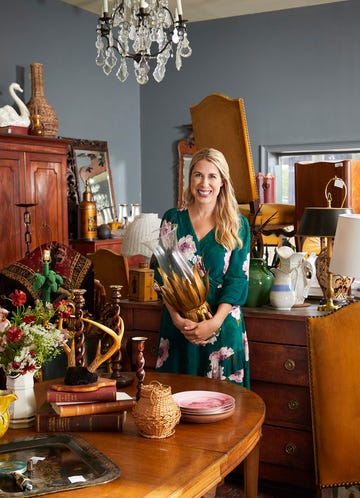 rachel hardage barrett, editor in chief of country living, in an antiques store