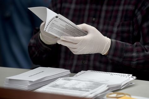 county employee opens mail in ballots at the luzerne county