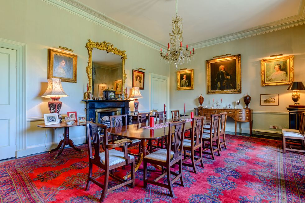 Traditional dining room with red furnishings