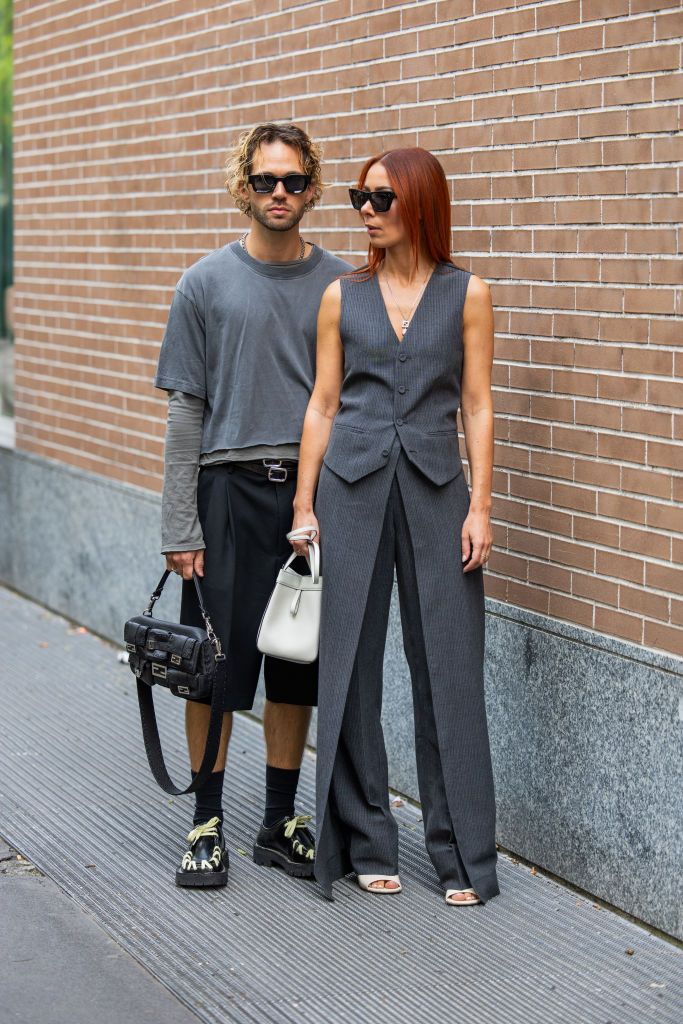 couple alice barbier wears grey asymmetric vest pants news photo
