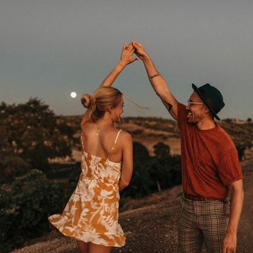 couple dancing outdoors at dusk,paso robles,ca,united states,usa