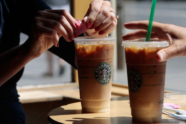 Couple having iced lattes