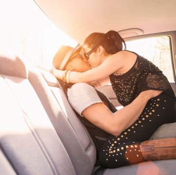 couple in car, kissing