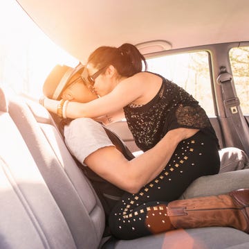 couple in car, kissing