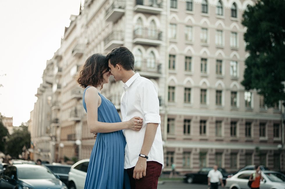 Couple kissing on the street