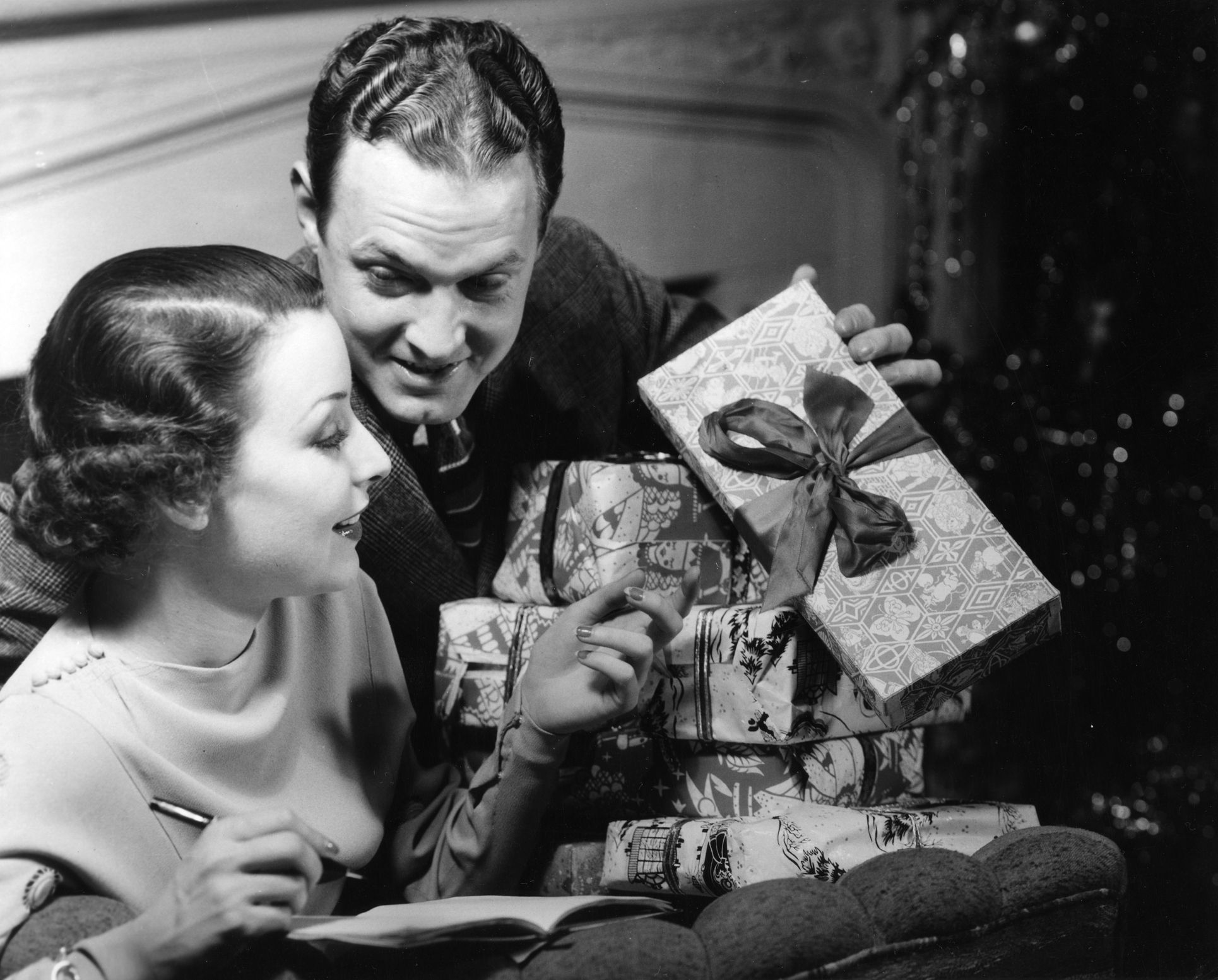 couple looking at christmas gifts