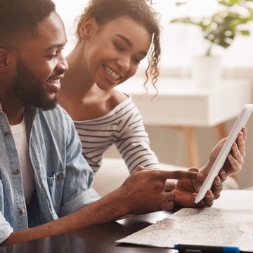 couple planning vacation trip, searching places to visit