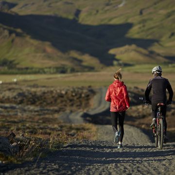couple running and biking together